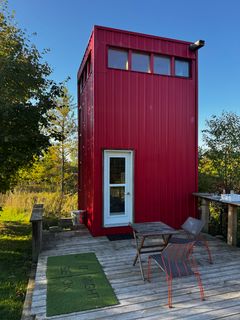 The red tower is an Airbnb tiny home that I rented for two nights. Cozy and fairly secluded.