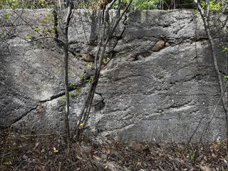 The old and broken foundation of a barn now found on crown land.